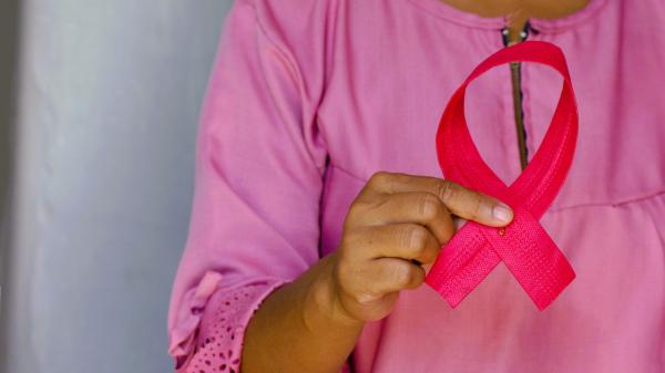 Pink ribbon symbolizing breast cancer awareness during Pink October 2024
