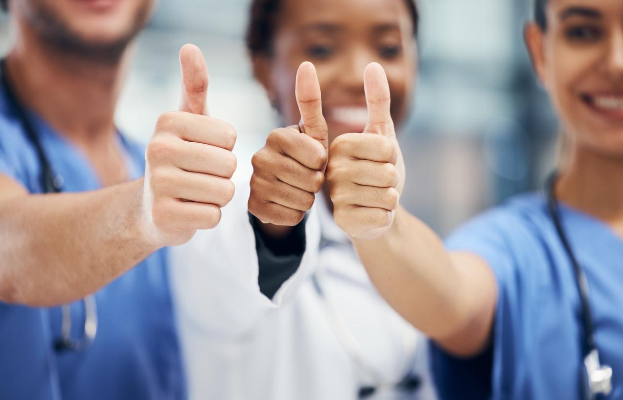 Picture of people with thumbs up